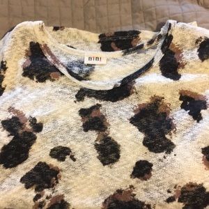 Long sleeve bibi local boutique knit sweater.